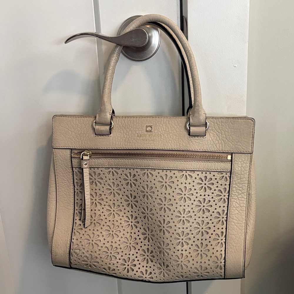 Kate spade Elegant Beige Handbag with Floral Cutouts